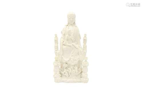 A CHINESE BLANC-DE-CHINE 'GUANYIN AND CHILD' GROUP