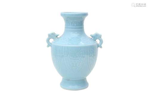 A CHINESE PALE BLUE-GLAZED VASE