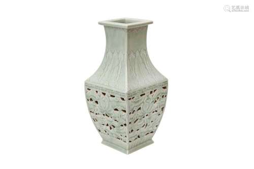 A CHINESE CELADON-GLAZED RETICULATED 'LOTUS POND' VASE