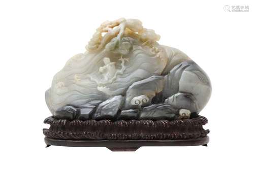 A CHINESE PALE CELADON AND GREY JADE 'MOUNTAIN' CARVING