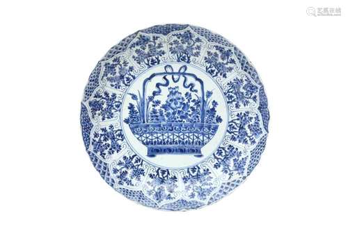 A CHINESE BLUE AND WHITE 'FLOWER BASKET' DISH