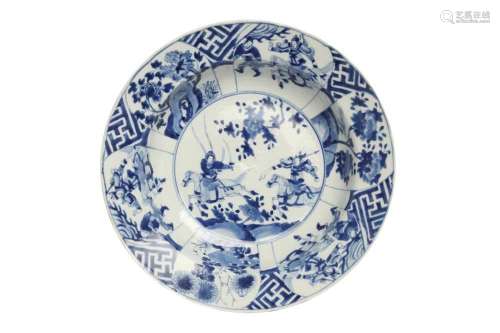 A CHINESE BLUE AND WHITE 'EQUESTRIAN' DISH