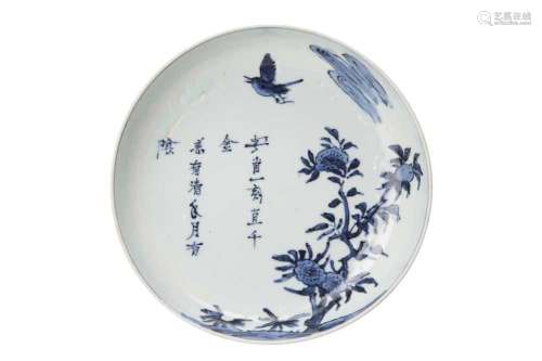 A CHINESE BLUE AND WHITE 'BIRD AND FLOWERS' DISH