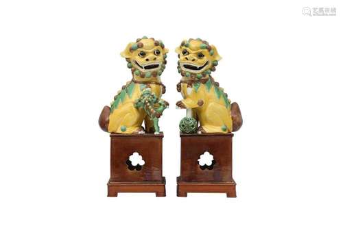 A PAIR OF CHINESE FAMILLE VERTE LION DOGS