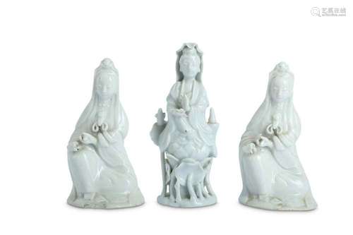 THREE SMALL CHINESE BLANC-DE-CHINE FIGURES OF GUANYIN