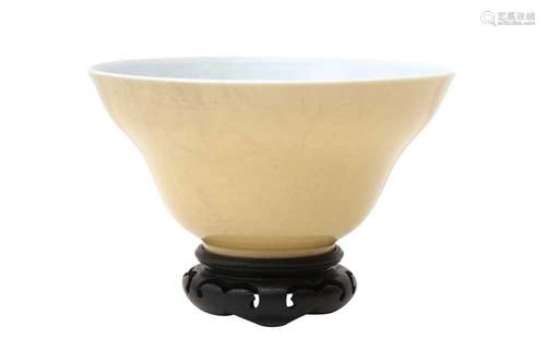 A CHINESE CREAM-GLAZED OGEE BOWL