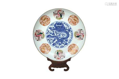 A CHINESE ENAMELLED BLUE AND WHITE 'DRAGONS' CHARGER