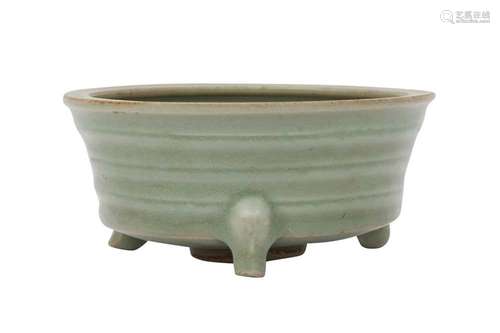 A CHINESE CELADON-GLAZED TRIPOD INCENSE BURNER