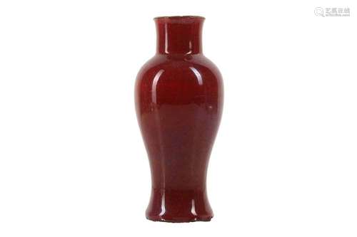 A CHINESE COPPER RED-GLAZED BALUSTER VASE