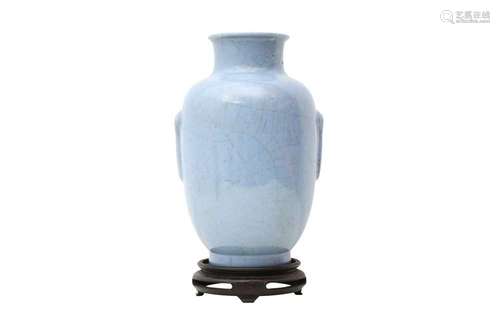 A CHINESE PALE BLUE-GLAZED LANTERN VASE