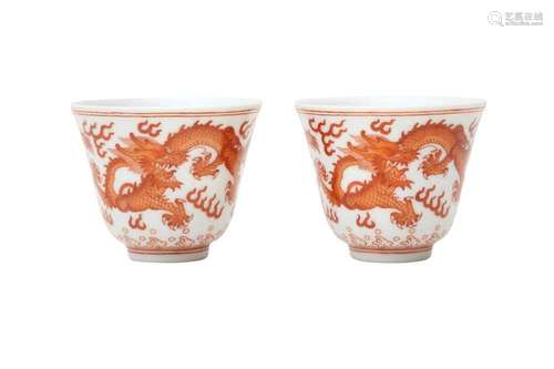 A PAIR OF CHINESE COPPER-RED 'DRAGON' CUPS