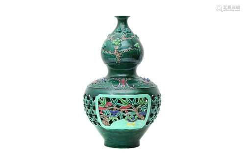 A CHINESE RETICULATED DOUBLE-WALLED DOUBLE GOURD VASE