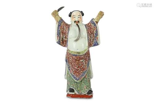 A CHINESE FAMILLE ROSE FIGURE OF AN IMMORTAL