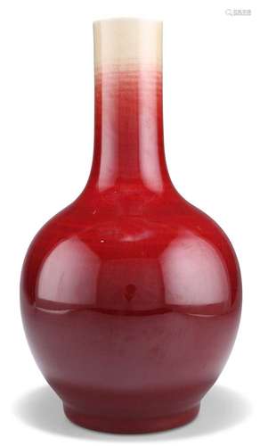 A CHINESE SANG-DE-BOEUF BOTTLE VASE