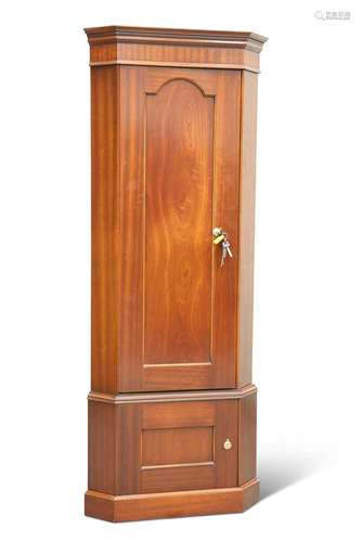 A CORNER MAHOGANY GUN CABINET