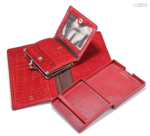 A CARTIER RED LEATHER CIGARETTE CASE; A MULBERRY RED CONGO L...