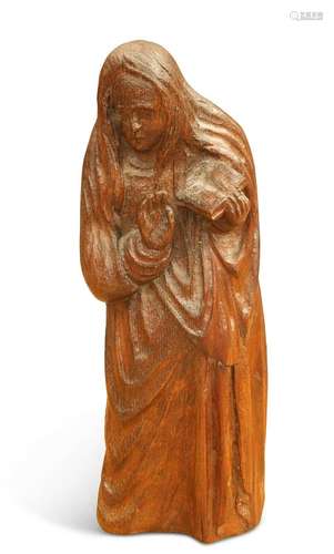 A 19TH CENTURY OAK CARVING OF A SAINT