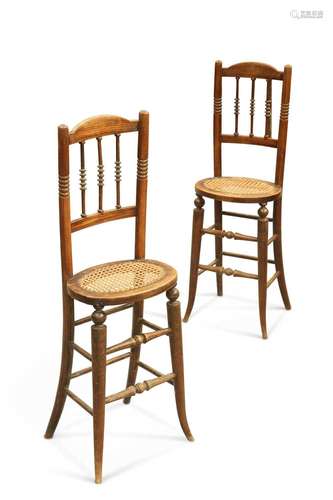 A PAIR OF 19TH CENTURY FAUX ROSEWOOD CORRECTION CHAIRS