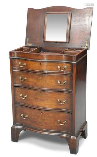 A GEORGE III STYLE MAHOGANY SERPENTINE BACHELOR’S CHEST, EAR...