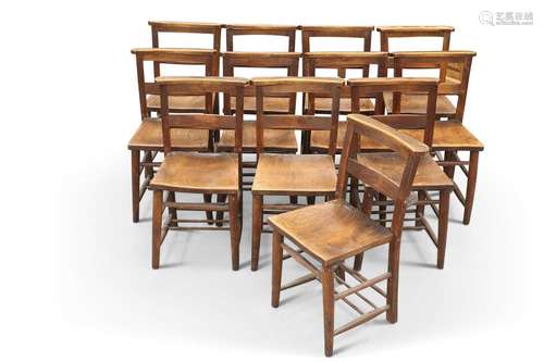 A GROUP OF TWELVE BEECH AND OAK CHAPEL CHAIRS, LATE 19TH/EAR...