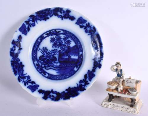 AN ANTIQUE FLOW BLUE PLATE together with an unusual figure o...