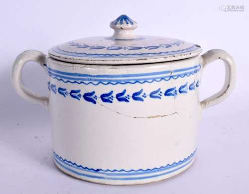 AN 18TH CENTURY EUROPEAN DELFT TWIN HANDLED POSSET POT AND C...