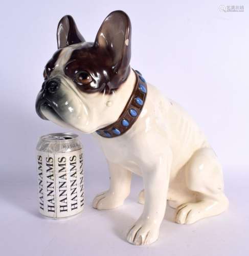 A LARGE ART DECO AUSTRIAN FIGURE OF A DOG modelled recumbent...
