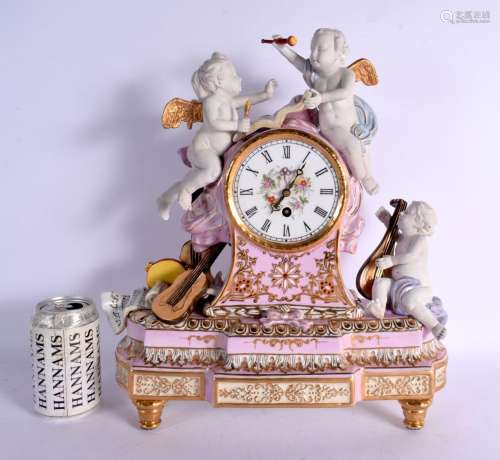 A LARGE CONTINENTAL PINK AND BISQUE PORCELAIN MANTEL CLOCK e...