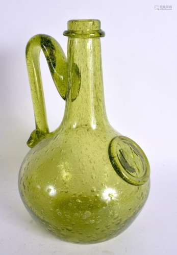 AN UNUSUAL ENGLISH GREEN GLASS WINE BOTTLE. 23 cm high.