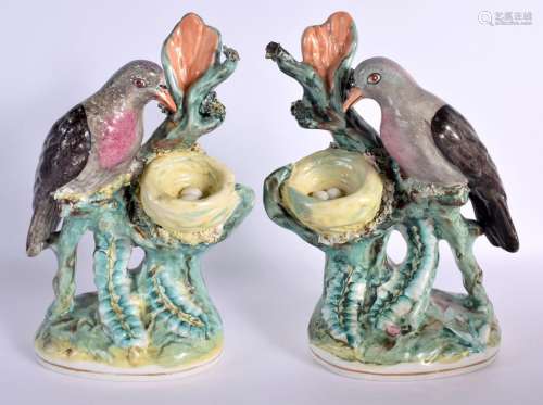 A RARE PAIR OF 19TH CENTURY STAFFORDSHIRE FIGURES OF DOVES m...