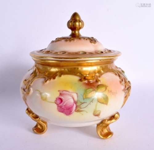 Royal Worcester pot pourri vase on three feet painted with r...