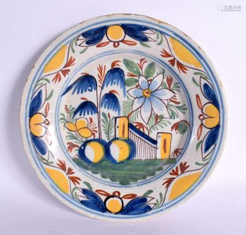 A SMALL 18TH CENTURY ENGLISH DELFT TIN GLAZED DISH painted w...