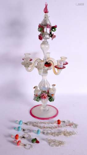 AN UNUSUAL 1920S VASELINE GLASS CANDLESTICK. 61 cm high.