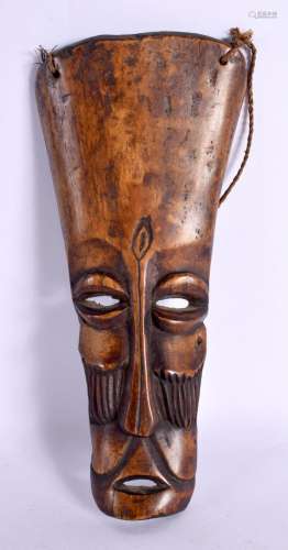 AN EARLY 20TH CENTURY AFRICAN CARVED BONE TRIBAL MASK. 25 cm...