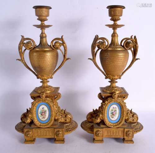 A PAIR OF ANTIQUE FRENCH ORMOLU AND SEVRES PORCELAIN CANDLES...