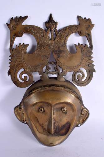 A RARE 19TH CENTURY MIDDLE EASTERN INDIAN BRONZE MASK PLAQUE...