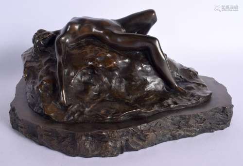 A CONTEMPORARY BRONZED SCULPTURE OF A RECLINING FEMALE model...