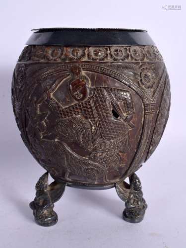 A MID 19TH CENTURY INDIAN CARVED COCONUT AND WHITE METAL CEN...
