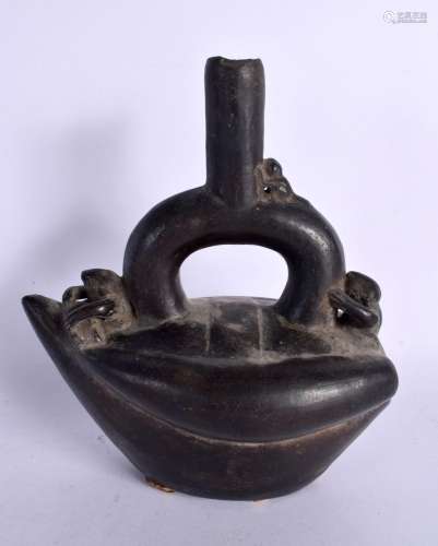 AN EARLY SOUTH AMERICAN BLACK POTTERY VESSEL overlaid with f...