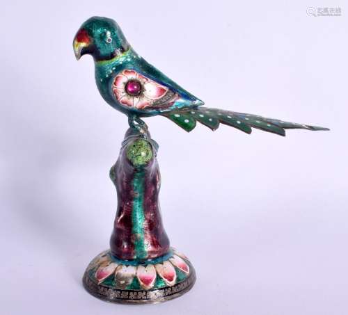 AN EARLY 20TH CENTURY INDIAN SILVER AND ENAMEL JEWELLED FIGU...