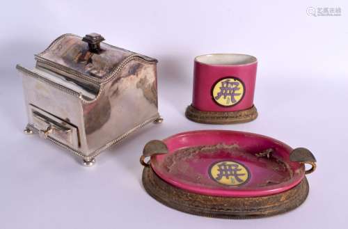 AN ANTIQUE SILVER PLATED INKWELL together with a Samsons dis...