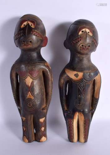 A PAIR OF AFRICAN TRIBAL POLYCHROMED TERRACOTTA FIGURES deco...
