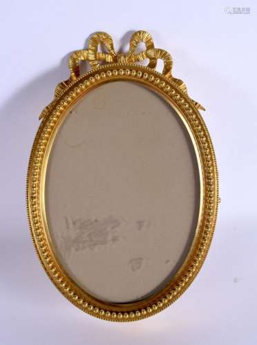 AN EARLY 20TH CENTURY FRENCH ORMOLU FOLDING PHOTOGRAPH FRAME...