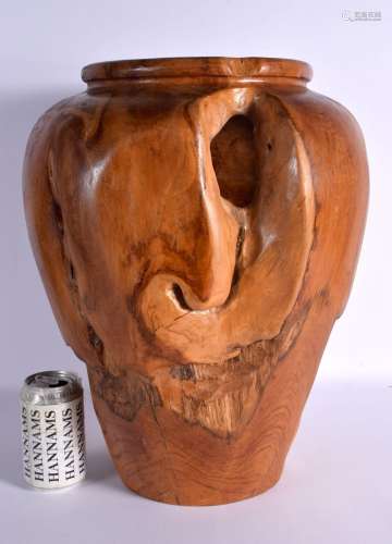 A LARGE VINTAGE CARVED HARDWOOD OPEN WORK ROTTED STYLE VASE....