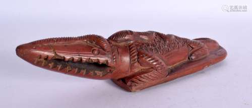 AN ANTIQUE MIDDLE EASTERN CROCODILE RASP. 18 cm x 5 cm.