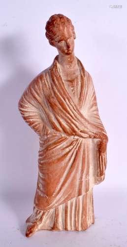 A MUSEUM COPY TERRACOTTA FIGURE OF A FEMALE. 28 cm high.