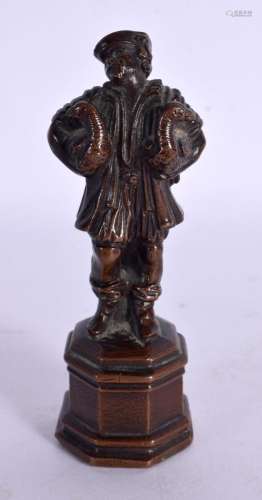 A 17TH/18TH CENTURY EUROPEAN BRONZE modelled as a male holdi...