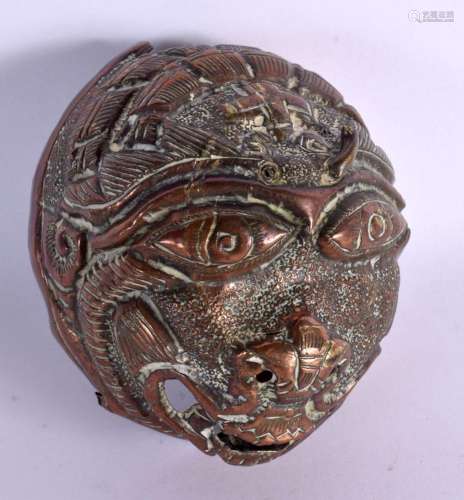 A 17TH/18TH CENTURY INDIAN COPPER ALLOY BUDDHISTIC MASK HEAD...