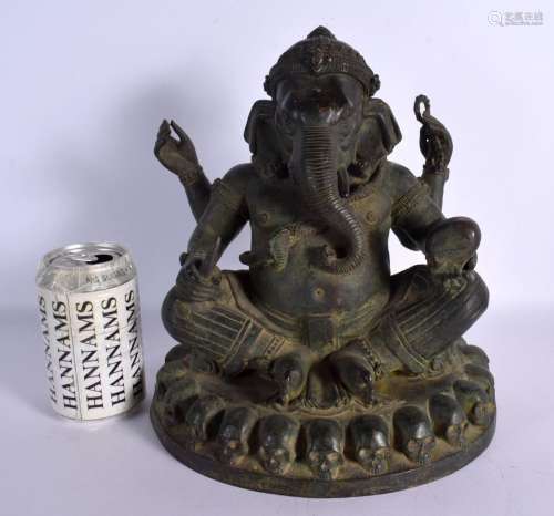 AN UNUSUAL 19TH CENTURY INDIAN BRONZE FIGURE OF GANESHA mode...