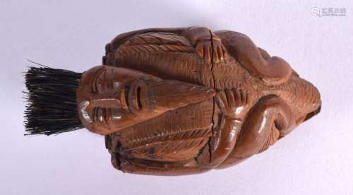 A 19TH CENTURY FRENCH CARVED COQUILLA NUT SNUFF BOX formed a...
